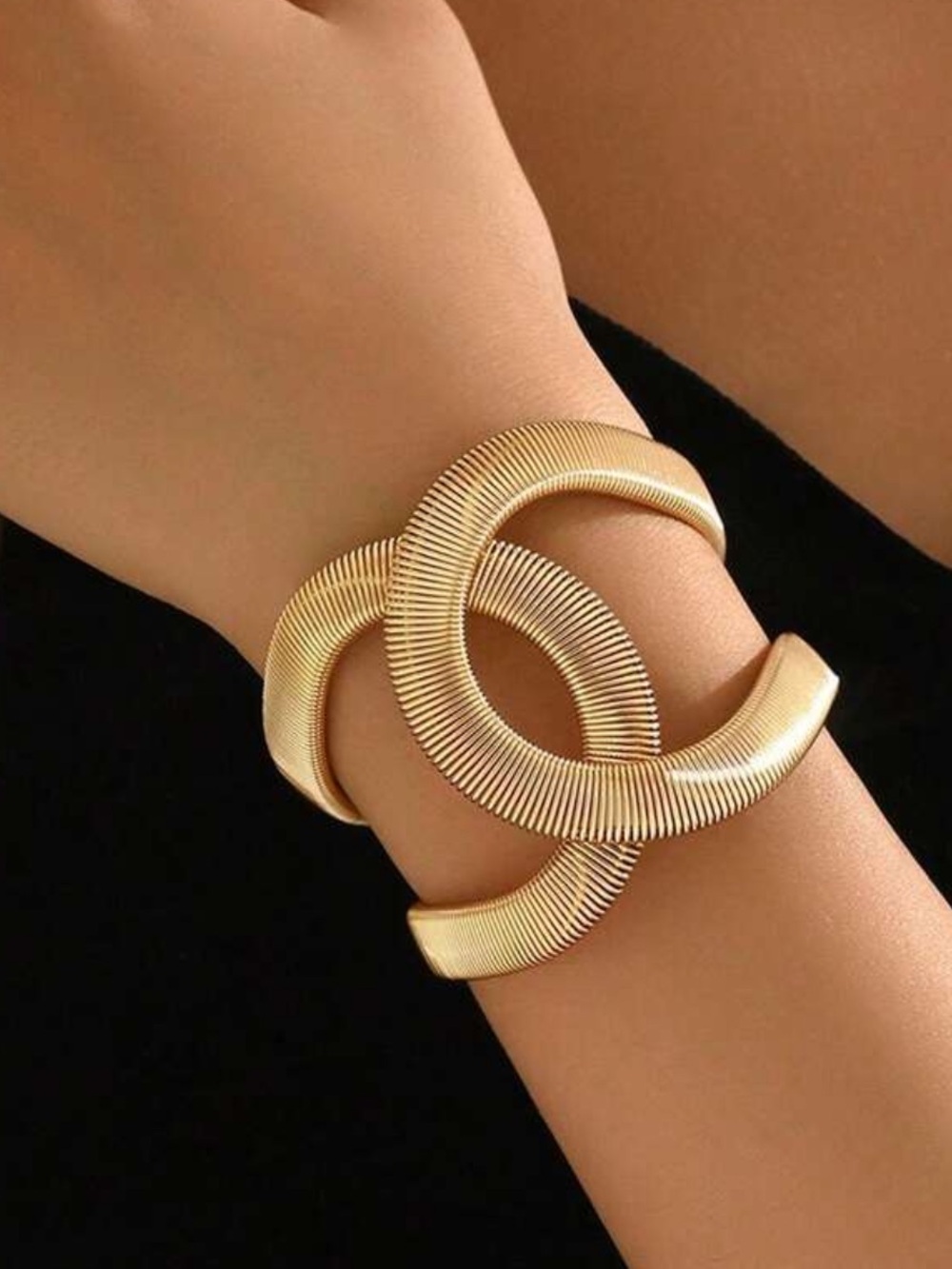 Gold Tone Sculptural Interlocking C Bracelet